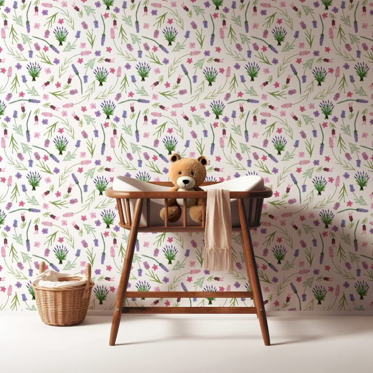 Teddy bear sits in a wooden crib against a vibrant floral patterned wall.